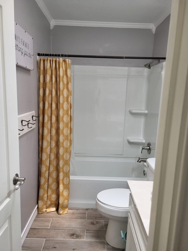 fiberglass tub and new flooring